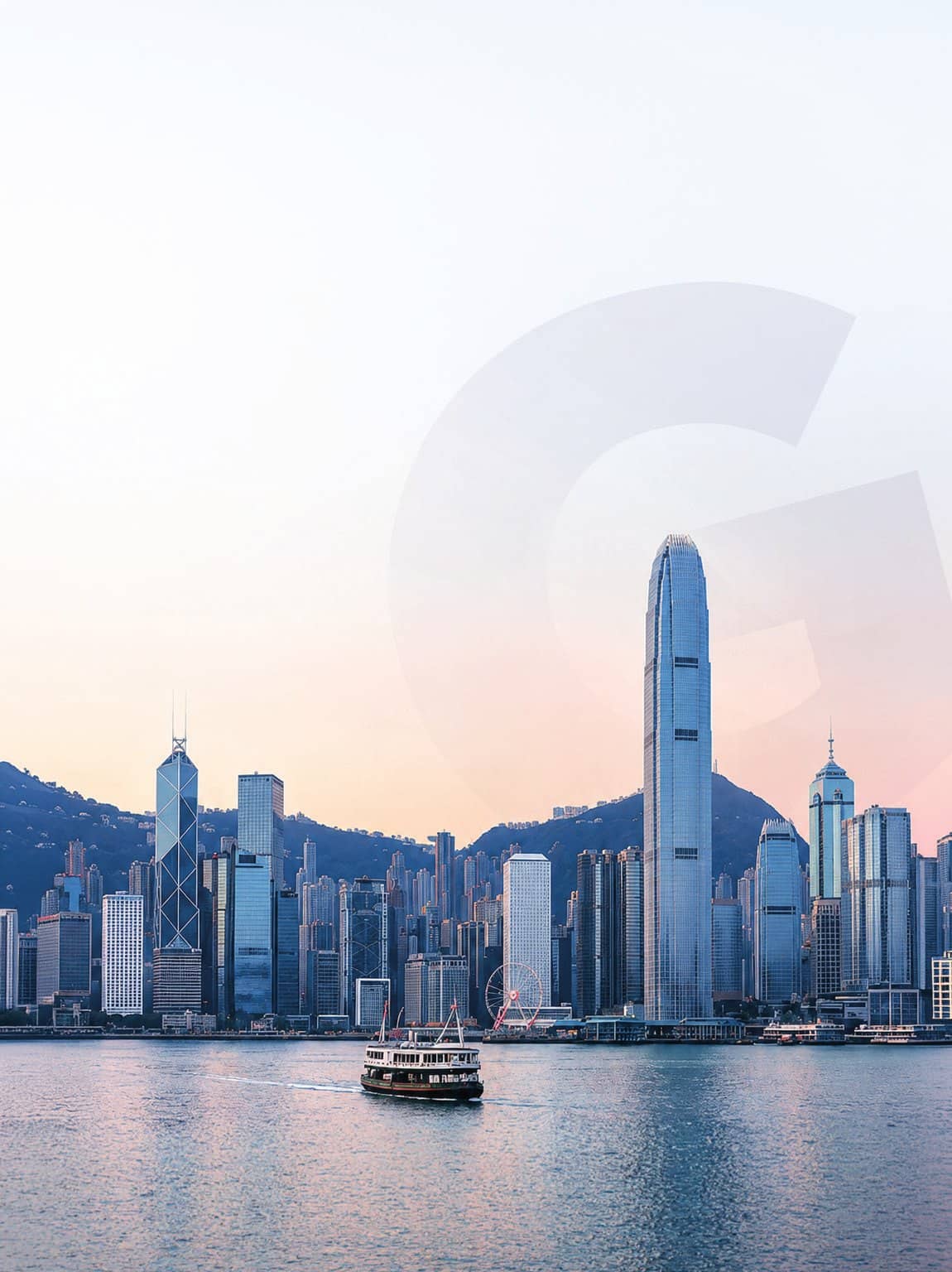 The Hong Kong skyline and Victoria Harbour at dusk